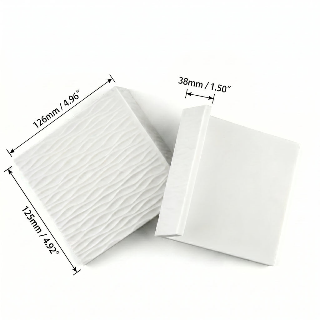 Metric and imperial sizing diagram for the compact slate grey tactile silicone espresso tamping block.