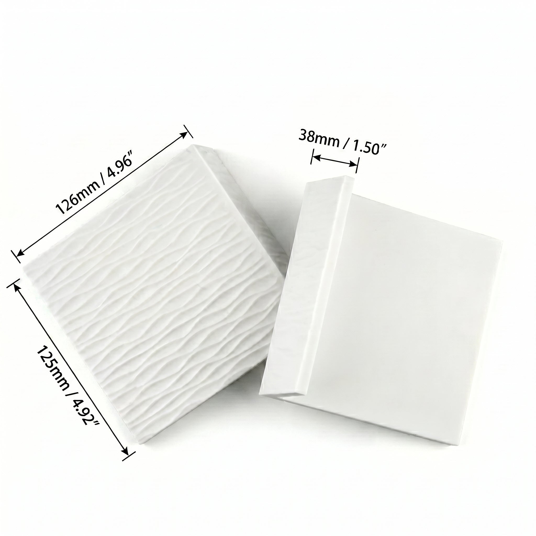 Metric and imperial sizing diagram for the compact slate grey tactile silicone espresso tamping block.